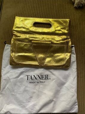Tanner Metallic Gold Fold-Over Clutch with Cutout Handle
